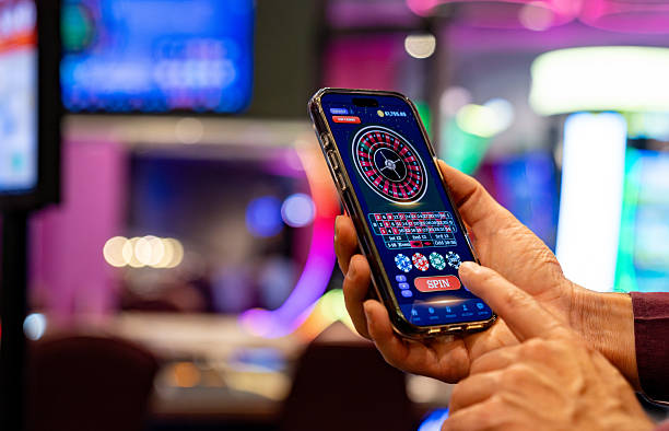 Book of Dead slot game interface on ldt toto mobile app showing Egyptian theme and expanding wild symbols